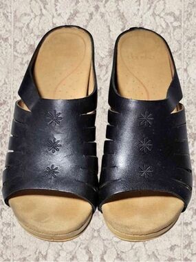 Dansko Black Leather Slide Mules with Star Embossing